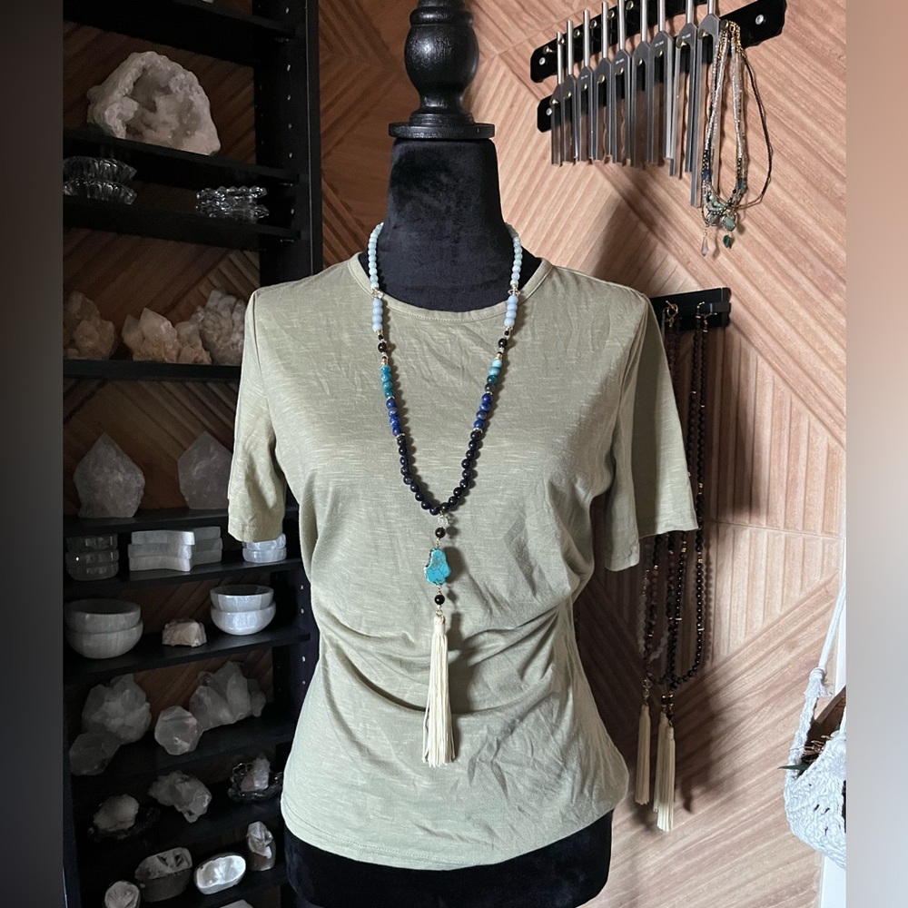 Soft green elevated basic short sleeve tee with back slit size small. Staple
